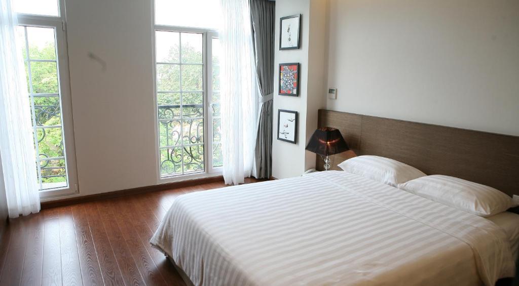 Idc White House Apartment Hanoi Room photo